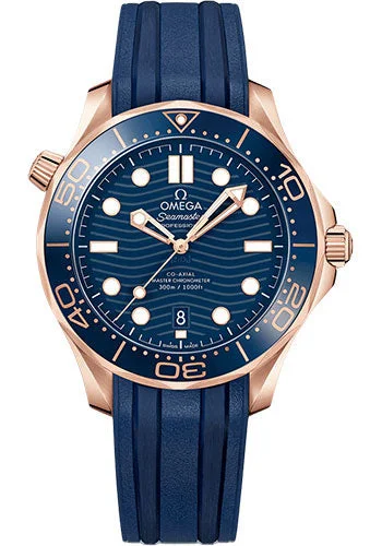 Omega Seamaster Diver 300M Omega Co-Axial Master Chronometer - 42 mm Sedna Gold Case - Blue Dial - Blue Rubber Strap - 210.62.42.20.03.001